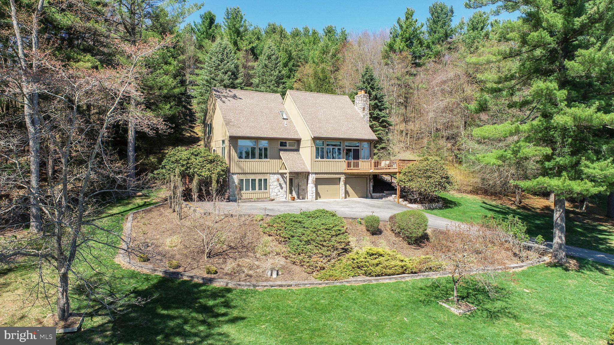 59 Glenview Road Swanton, MD 21561 - Photo 64 of 85 an aerial view of a house with backyard and trees