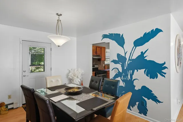 a view of a workspace with furniture