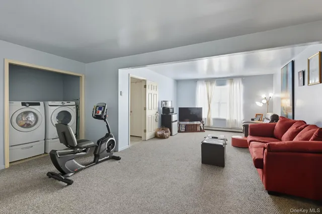 a view of a livingroom with furniture and a living room