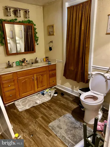 a bathroom with a sink and a shower