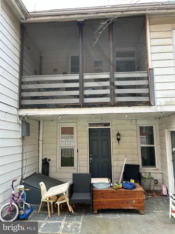 a view of a field with an trees