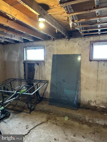 a view of a house with a yard and garage