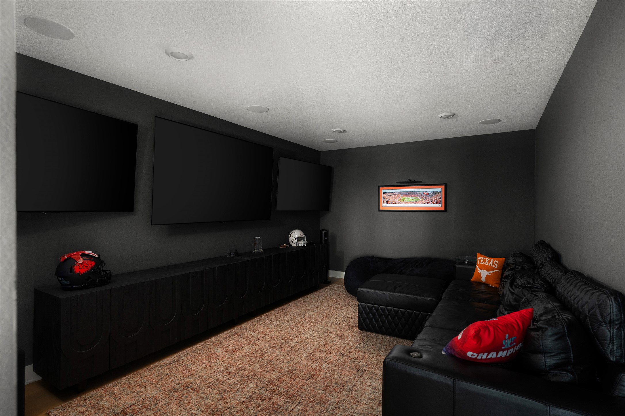 7917 Edmondson Bend Austin, TX 78744 - Photo 17 of 24 Media room featuring multiple wall-mounted screens and recessed ceiling lighting