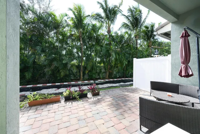 a view of backyard with furniture