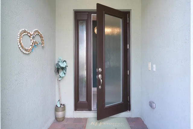 a view of a hallway with elevator