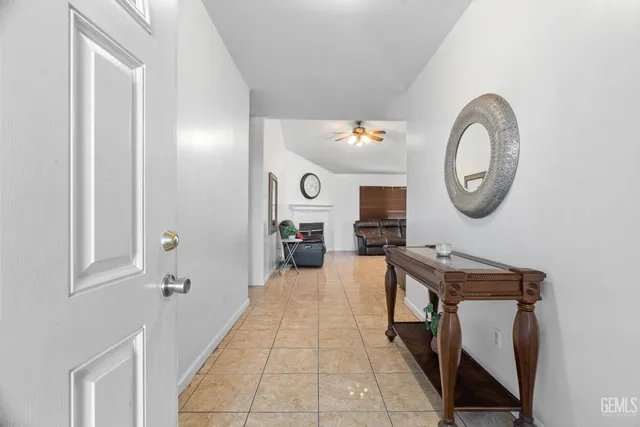 a view of a bedroom with a bed and furniture