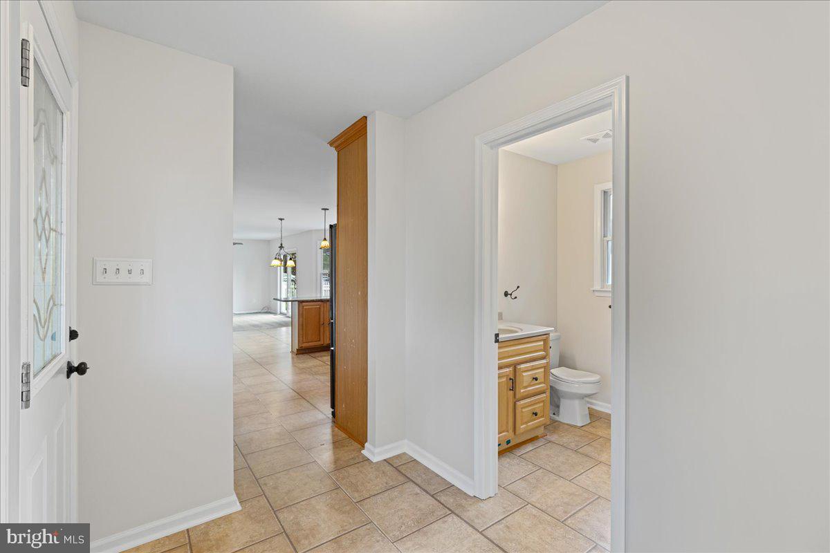 51 Egbert Street Pemberton, NJ 08068 - Photo 18 of 36 a view of a hallway with bathroom and a bathroom