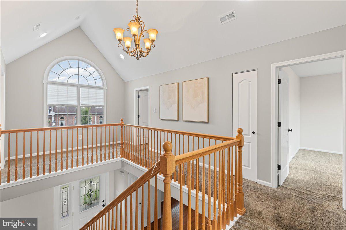 51 Egbert Street Pemberton, NJ 08068 - Photo 21 of 36 a view of entryway with wooden floor and chandelier