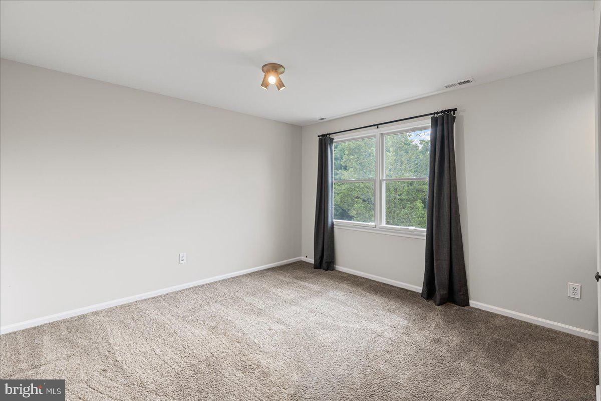 51 Egbert Street Pemberton, NJ 08068 - Photo 22 of 36 an empty room with windows