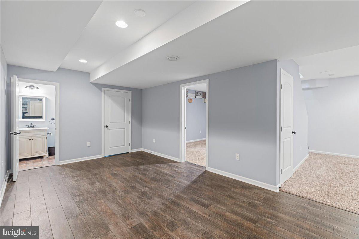 51 Egbert Street Pemberton, NJ 08068 - Photo 32 of 36 a view of a big room with wooden floor and windows