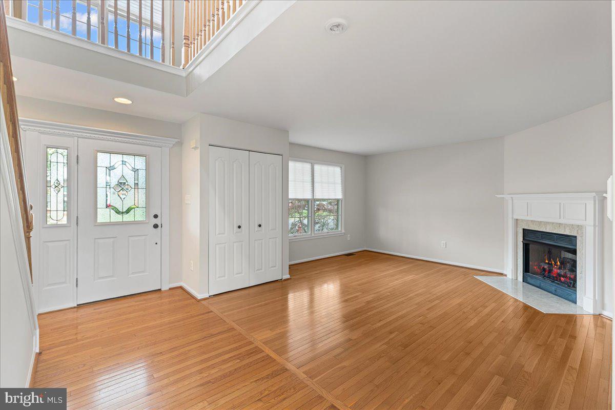 51 Egbert Street Pemberton, NJ 08068 - Photo 8 of 36 an empty room with windows and fireplace
