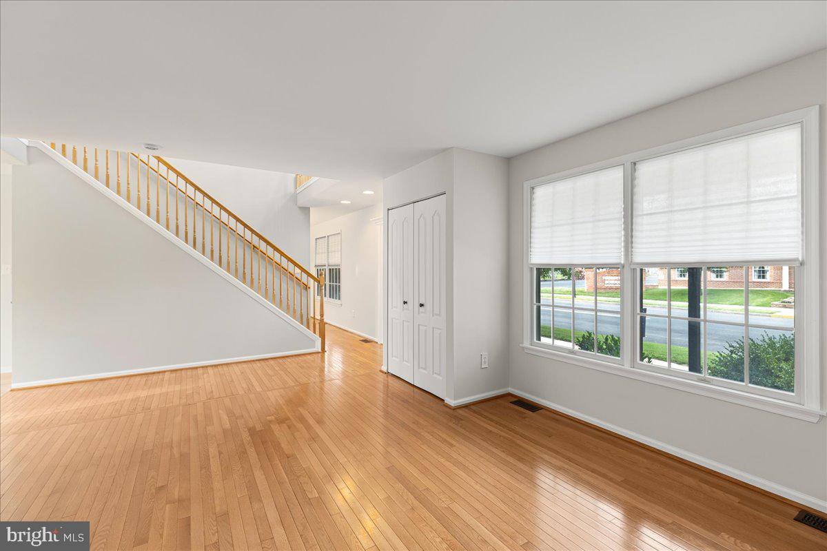 51 Egbert Street Pemberton, NJ 08068 - Photo 9 of 36 a view of an empty room with wooden floor and a window