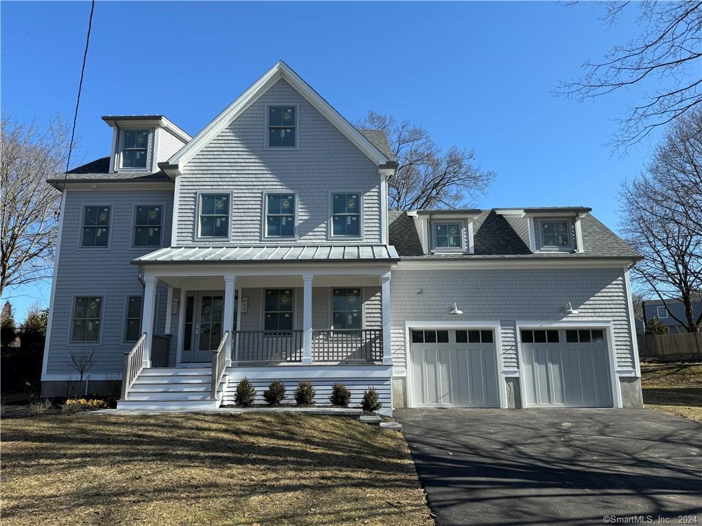 a front view of a house with a porch