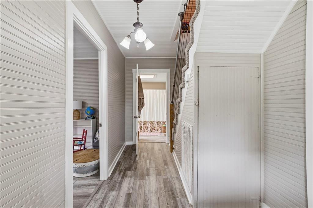 400 Sam Love Road Rocky Face, GA 30740 - Photo 29 of 29 a view of a hallway with wooden floor and staircase