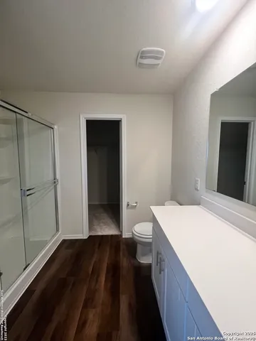 a view of bathroom with a sink and a toilet