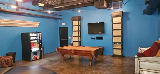 a room with furniture and window