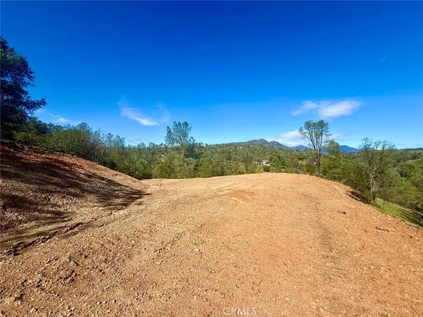 a view of a road with a yard