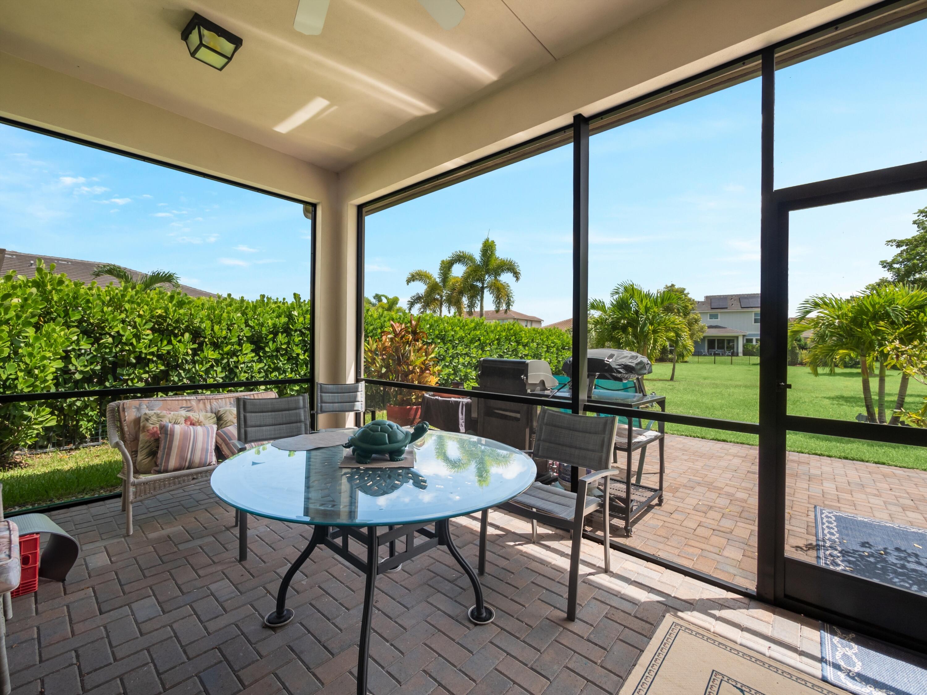 1062 Ember Ridge Run Loxahatchee, FL 33470 - Photo 19 of 34 Screened Lanai