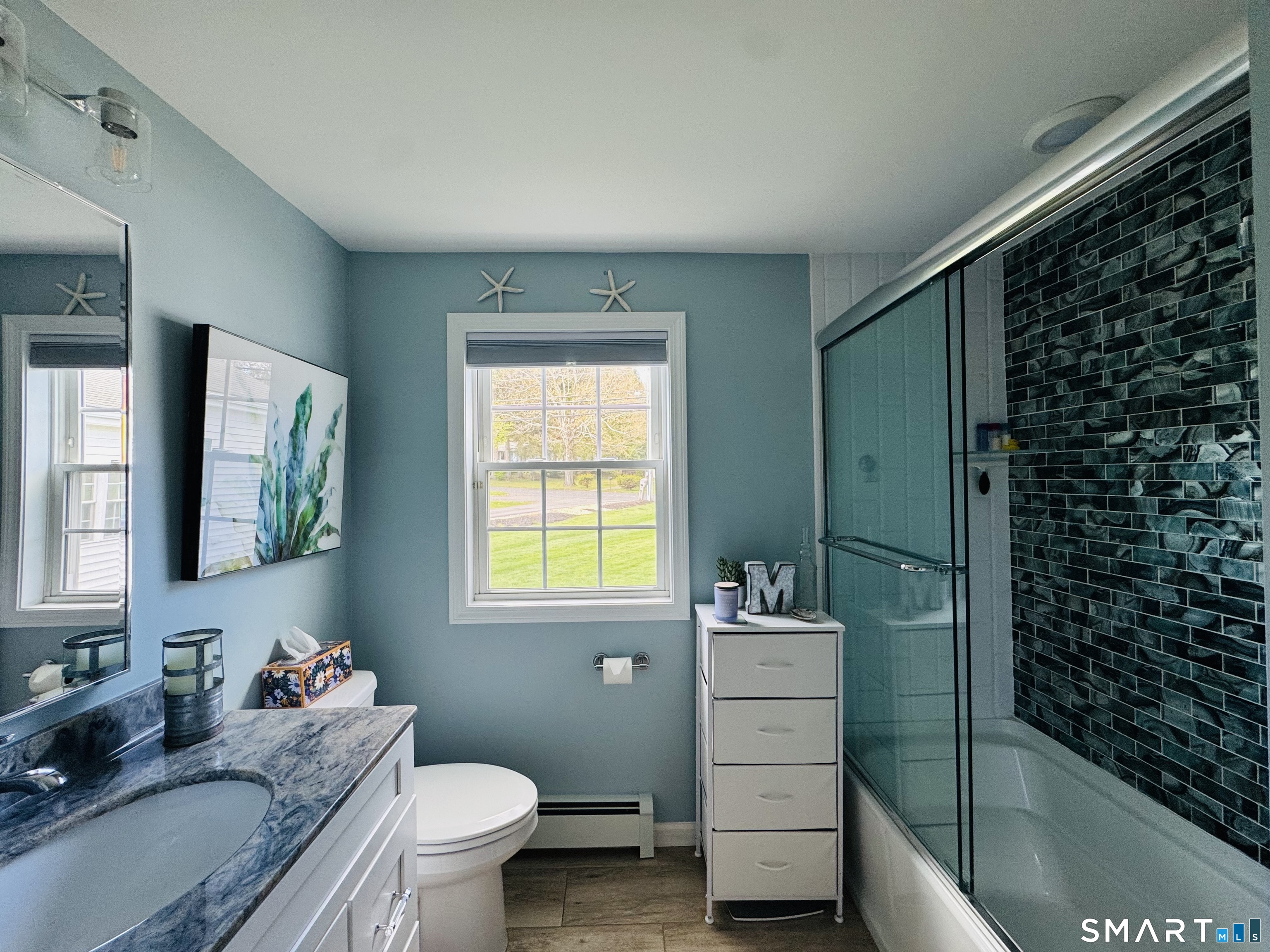 1514 Woodtick Road Wolcott, CT 06716 - Photo 14 of 23 a bathroom with a sink toilet vanity and tub