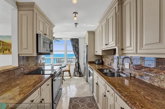 a bed room with a bed and a ceiling fan