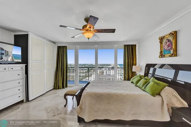 a view of swimming pool from a balcony