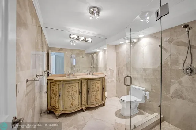 a view of a patio with dining table and chairs