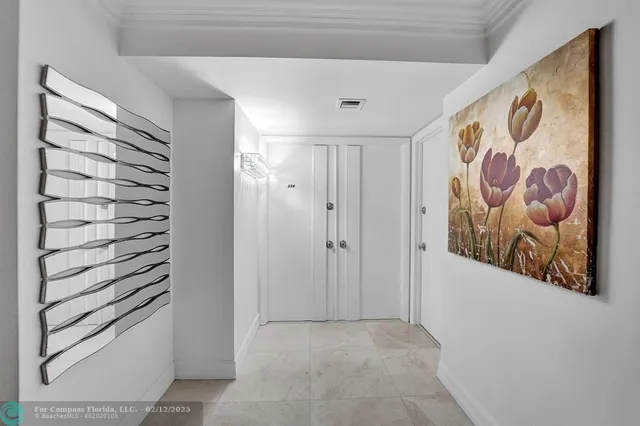 a living room with furniture wooden floor and a table