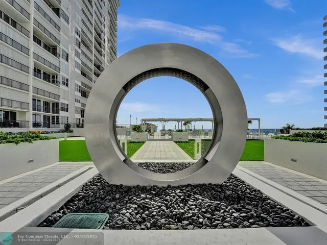 a view of a livingroom with furniture and staircase