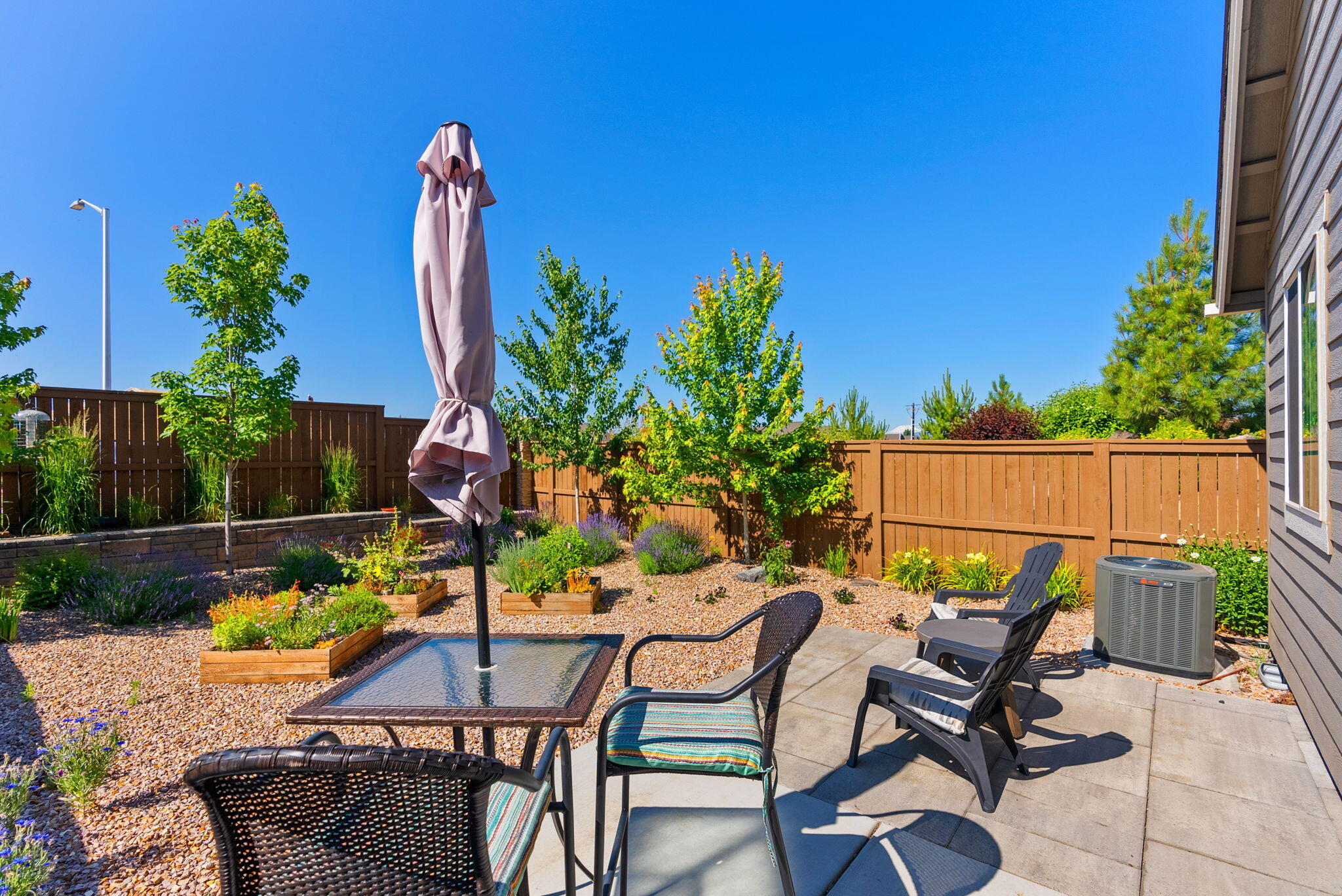 3859 Northeast Oakside Loop Bend, OR 97701 - Photo 24 of 51 Professional Landscaped Backyard
