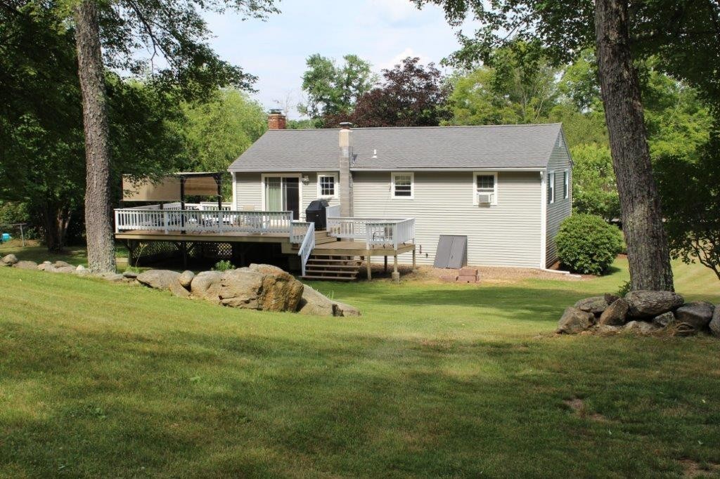 229 North Brookfield Road Barre, MA 01005 - Photo 24 of 30 a view of a house with a yard and sitting area