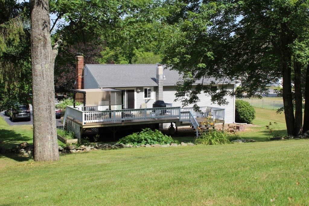 229 North Brookfield Road Barre, MA 01005 - Photo 5 of 30 a front view of a house with garden