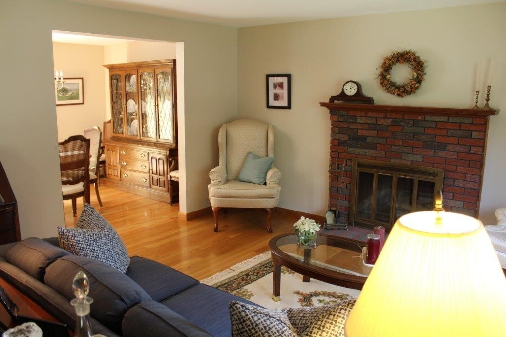 229 North Brookfield Road Barre, MA 01005 - Photo 7 of 30 a living room with furniture and a fireplace