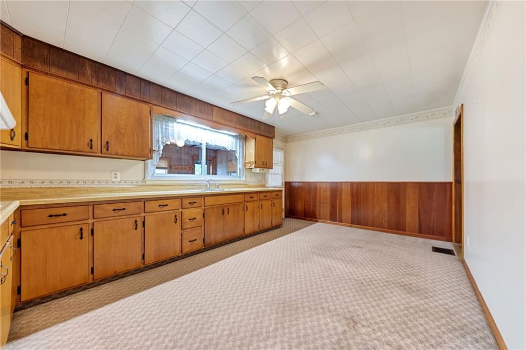 116 Eckles Drive Industry, PA 15052 - Photo 11 of 30 a kitchen with a sink cabinets and window