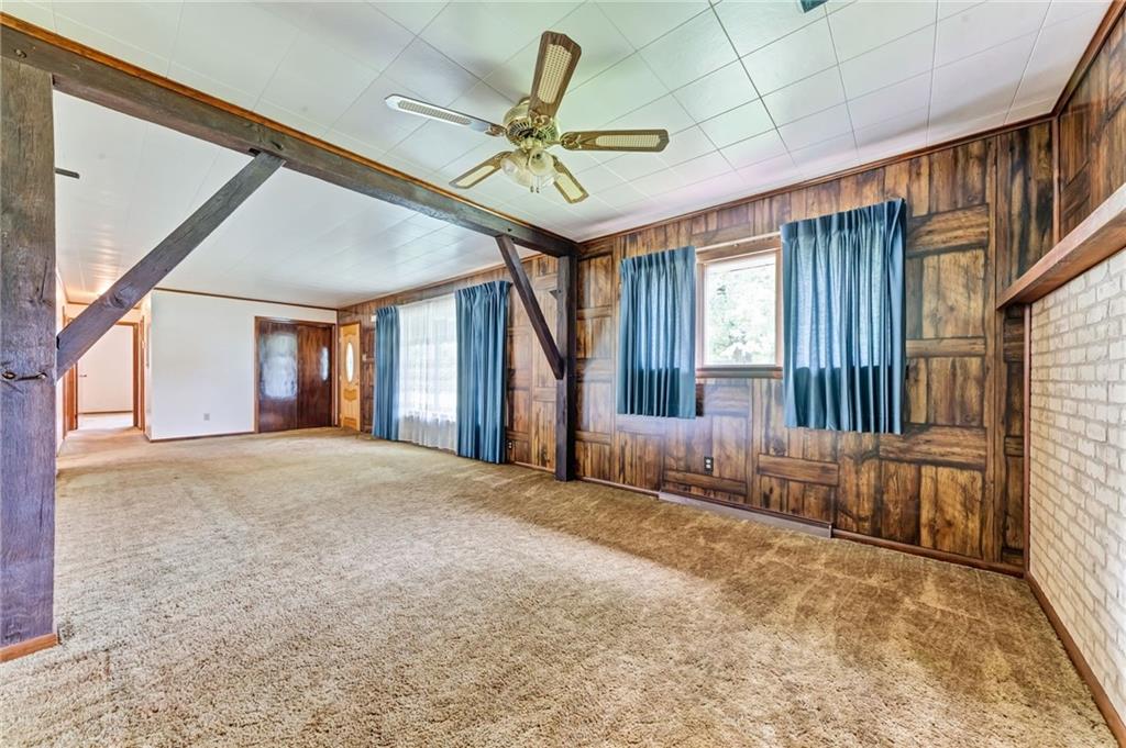 116 Eckles Drive Industry, PA 15052 - Photo 16 of 30 a very nice looking room with a ceiling fan