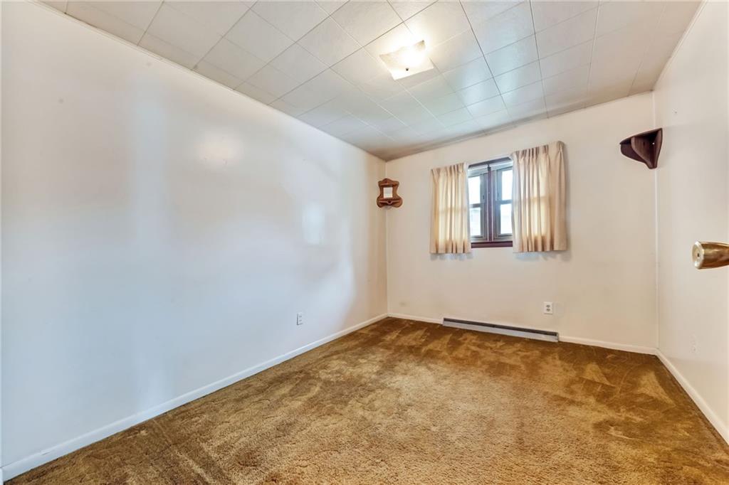 116 Eckles Drive Industry, PA 15052 - Photo 18 of 30 an empty room with windows