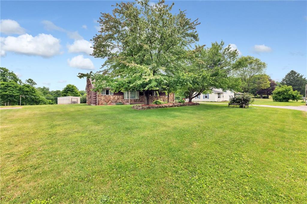116 Eckles Drive Industry, PA 15052 - Photo 2 of 30 a view of a field of grass and trees