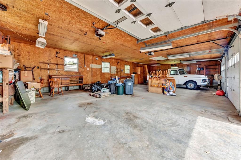 116 Eckles Drive Industry, PA 15052 - Photo 29 of 30 a view of parking garage with cars