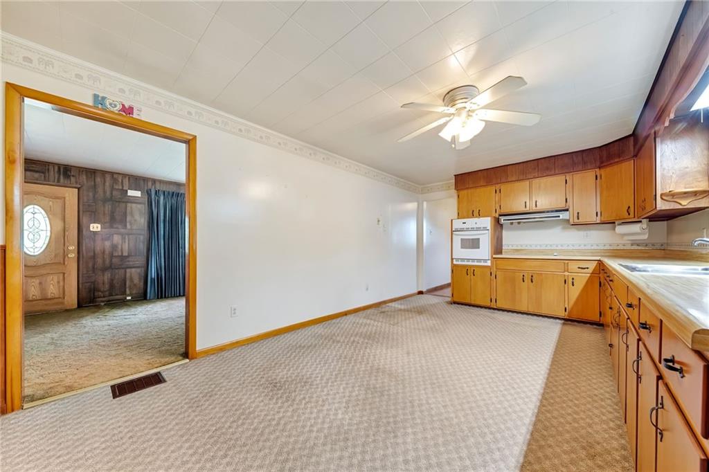 116 Eckles Drive Industry, PA 15052 - Photo 5 of 30 a view of a kitchen with a sink and cabinet area