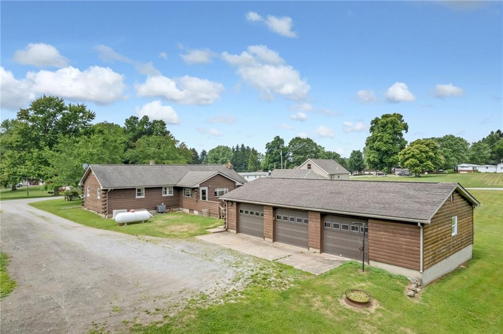 116 Eckles Drive Industry, PA 15052 - Photo 6 of 30 a view of a house with a yard and sitting area