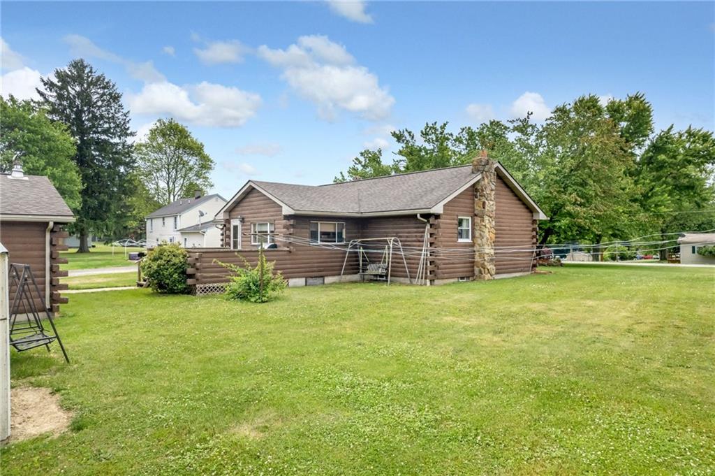 116 Eckles Drive Industry, PA 15052 - Photo 8 of 30 a front view of house with yard and green space
