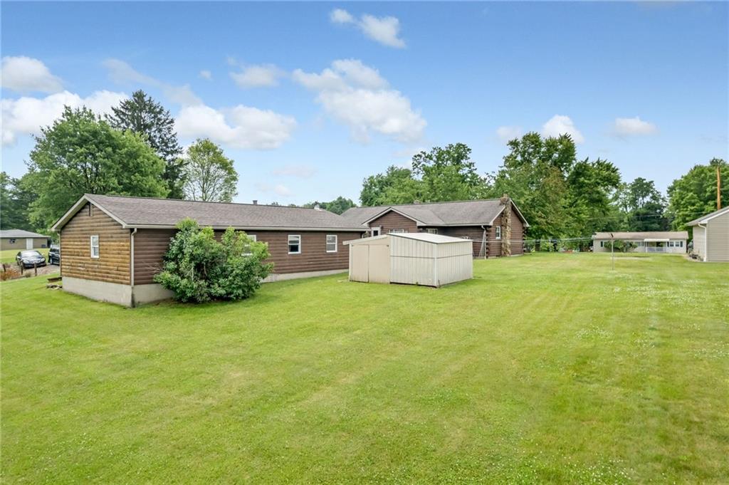 116 Eckles Drive Industry, PA 15052 - Photo 9 of 30 a front view of a house with garden