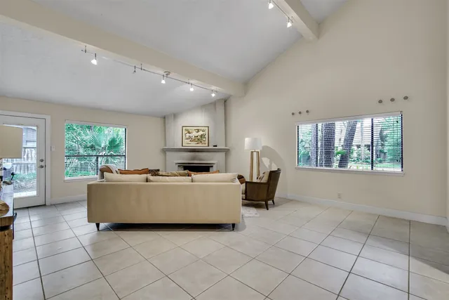 a living room with furniture and window