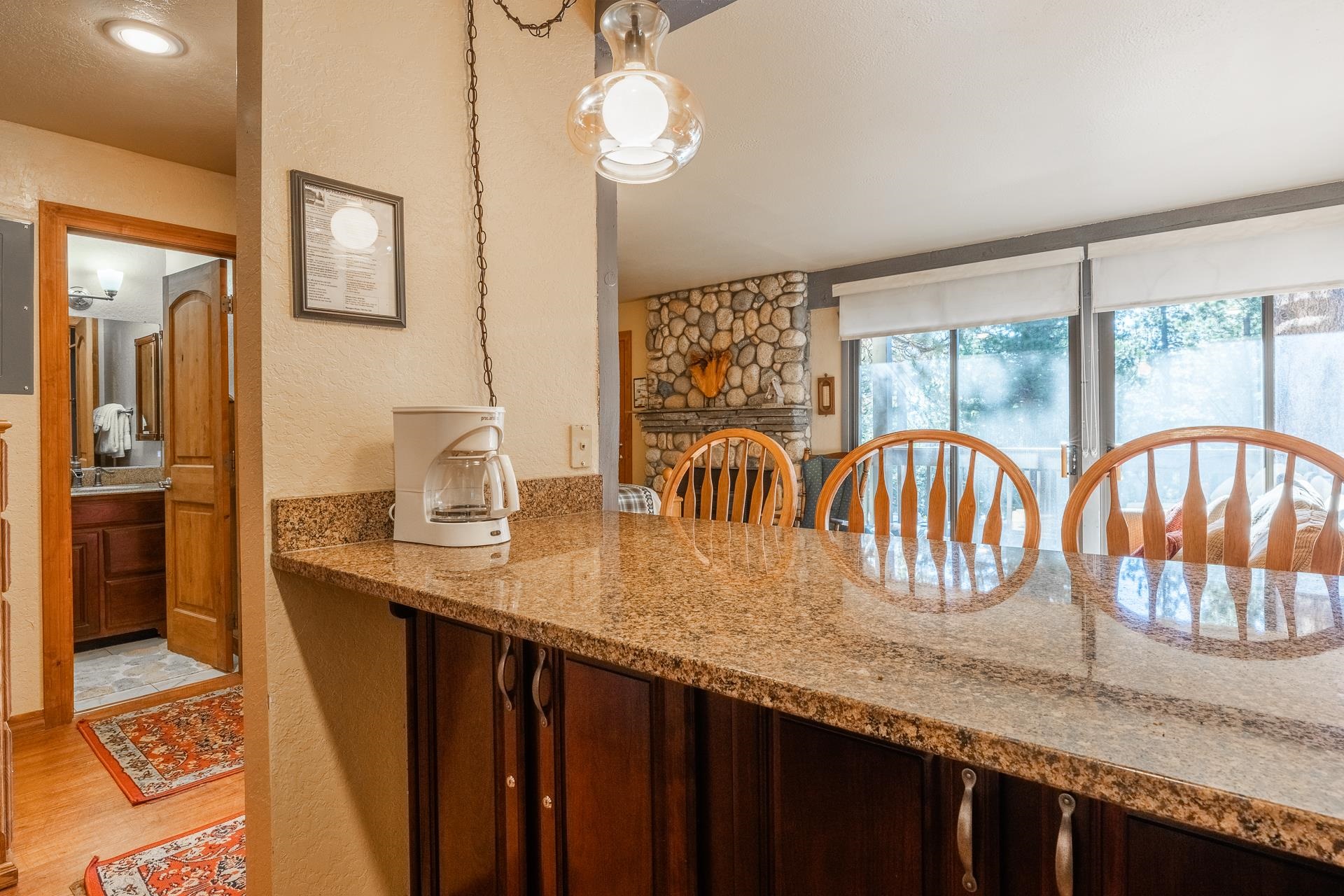 153 Lake Mary Road, Unit 29 Mammoth Lakes, CA 93546 - Photo 15 of 44 a kitchen with granite countertop a stove a sink and dishwasher