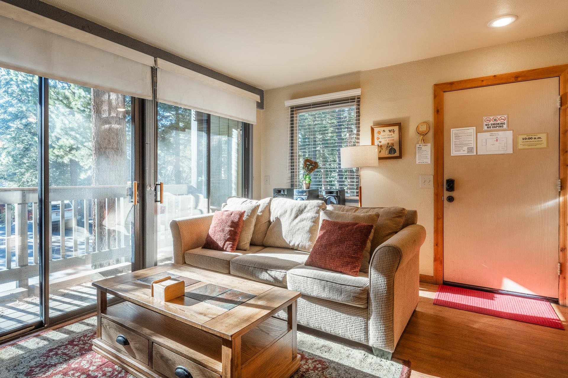 153 Lake Mary Road, Unit 29 Mammoth Lakes, CA 93546 - Photo 16 of 44 a living room with furniture and a floor to ceiling window