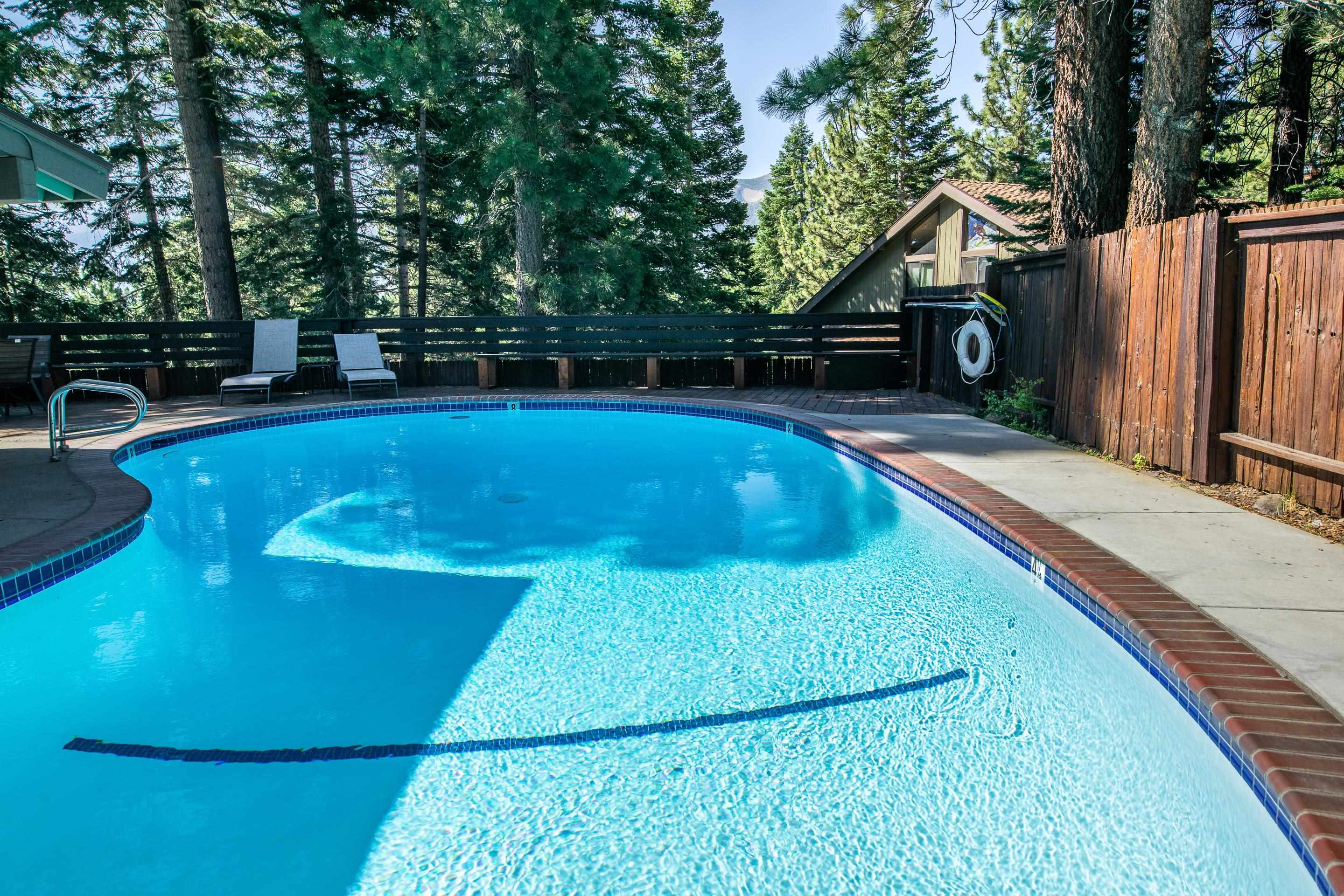 153 Lake Mary Road, Unit 29 Mammoth Lakes, CA 93546 - Photo 33 of 44 a view of a backyard with swimming pool