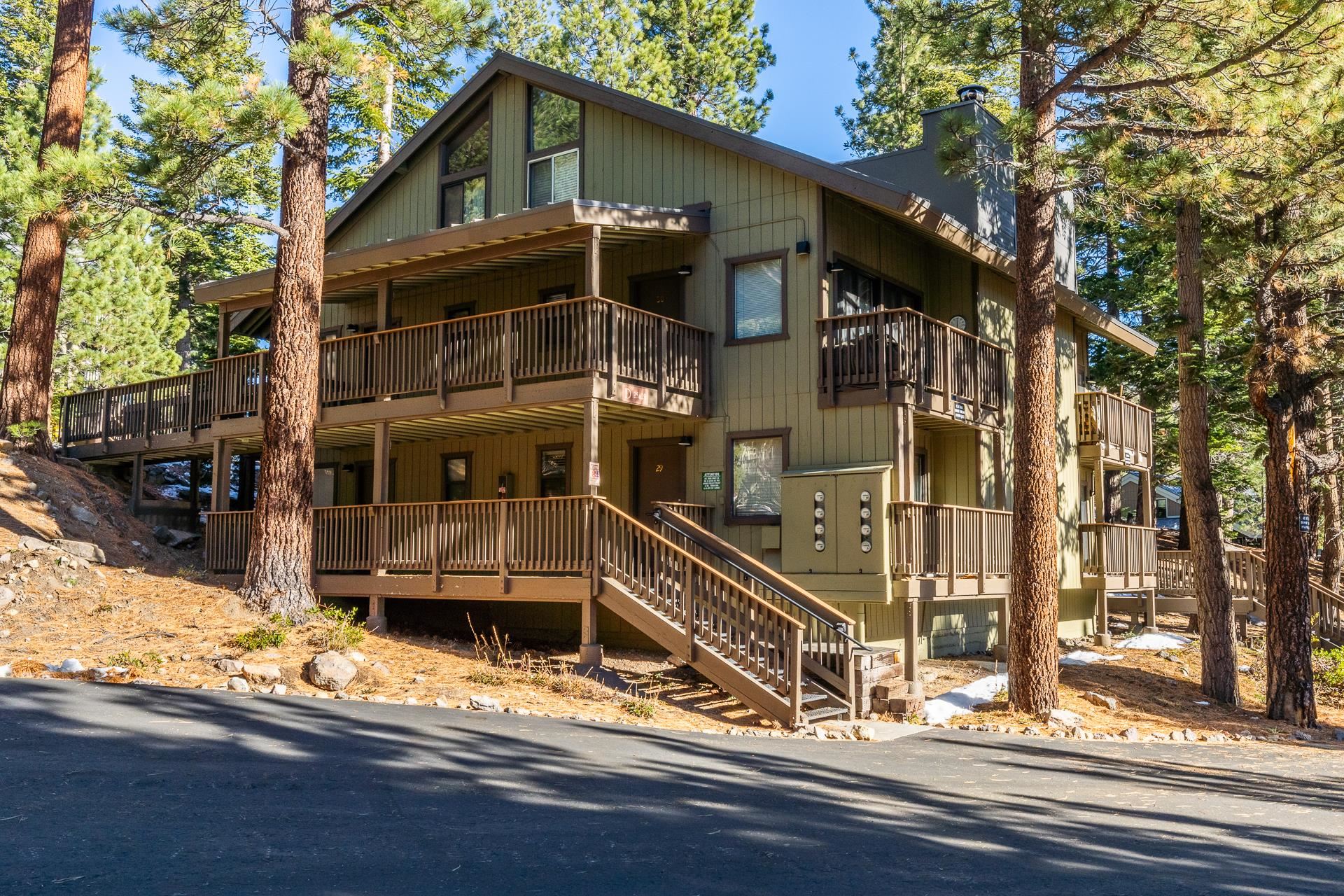153 Lake Mary Road, Unit 29 Mammoth Lakes, CA 93546 - Photo 41 of 44 a front view of a house with a yard