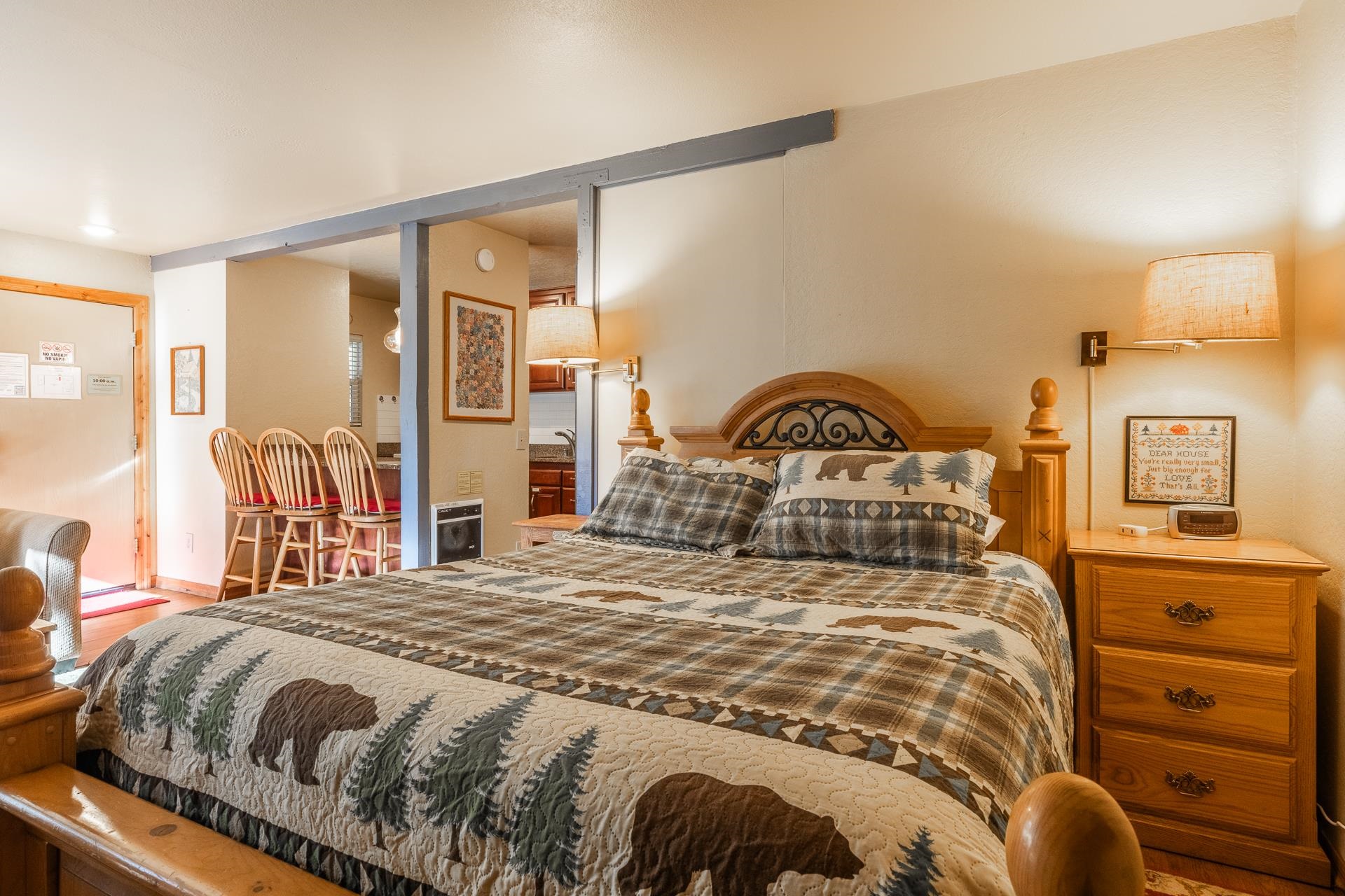 153 Lake Mary Road, Unit 29 Mammoth Lakes, CA 93546 - Photo 5 of 44 a bedroom with a bed and a large mirror on the dresser