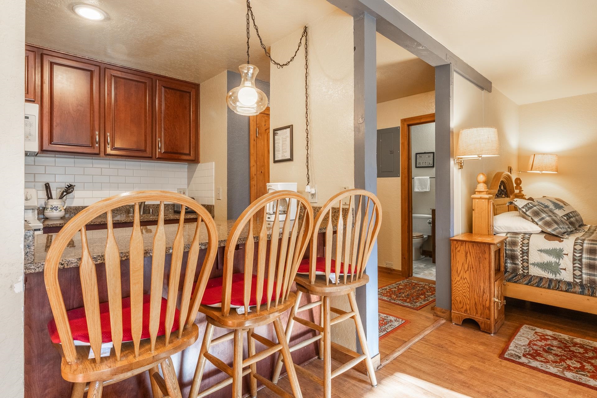 153 Lake Mary Road, Unit 29 Mammoth Lakes, CA 93546 - Photo 9 of 44 a view of a dining room with furniture and chandelier