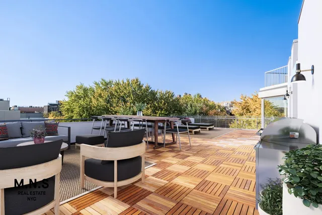a view of a chairs and tables in the patio