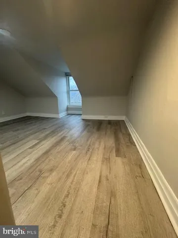 a view of a big room with wooden floor